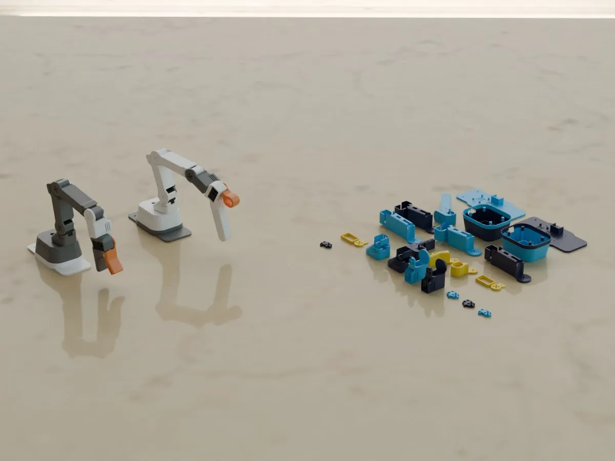 Robot arm pair, follower and leader, studio photo